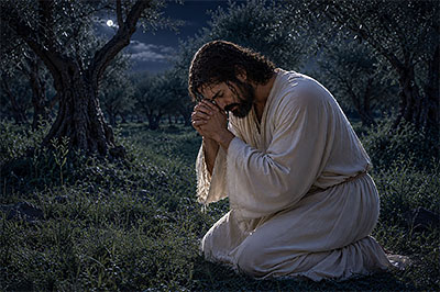 Jesus kneels in Gethsemane